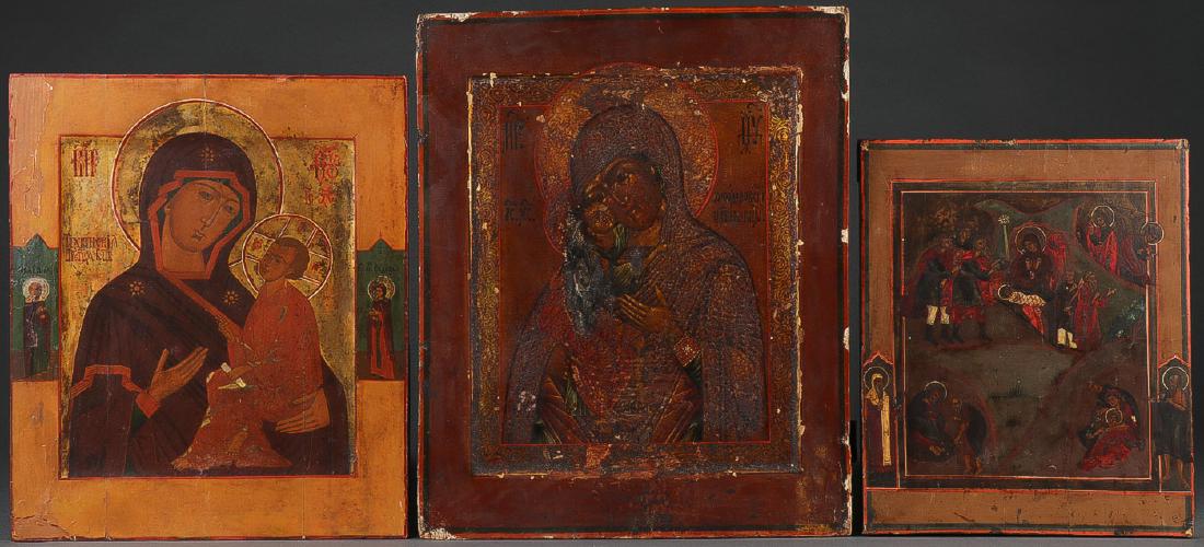 THREE RUSSIAN ICONS 19TH CENTURY: THREE RUSSIAN ICONS 19TH CENTURY. Depicting the Tikvin Mother of God, the borders with family saints, 14 inches x 11.75 inches (36 x 30 cm). Together with an icon of The Theodore Mother of God. 16 inc