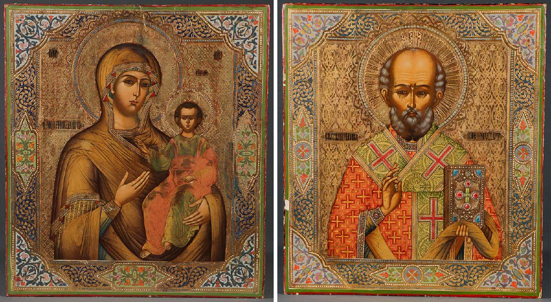 VERY FINE RUSSIAN DOUBLE SIDED ICON CIRCA 1890: A FINE RUSSIAN DOUBLE SIDED PROCESSIONAL ICON CIRCA 1890. One side painted with the Smolensk Mother of God the other side with Saint Nicholas. Both finely painted with extensive christography, the bac