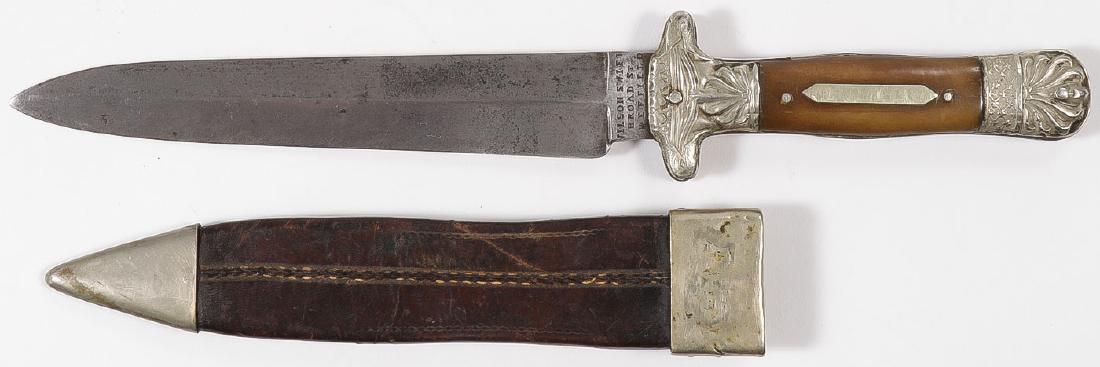 A SHEFFIELD BOWIE KNIFE WILSON SWIFT: A SHEFFIELD BOWIE KNIFE WILSON SWIFT. 6-inch spear-point single edge blade, the ricasso stamped “Wilson Swift Broad St. Sheffield” and on the opposite side the trademark DCL. With ornate G