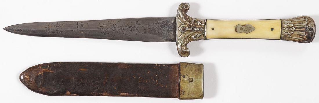 U.S. KNIFE & SHEATH BY EDWARD BARNES & SONS: U.S. KNIFE & SHEATH BY EDWARD BARNES & SONS, CIRCA 1850. The double edged tapering dirk-style blade stamped on one side of the ricasso “U*S” and the other side “EDWARD BARNES & SONS.” Bone