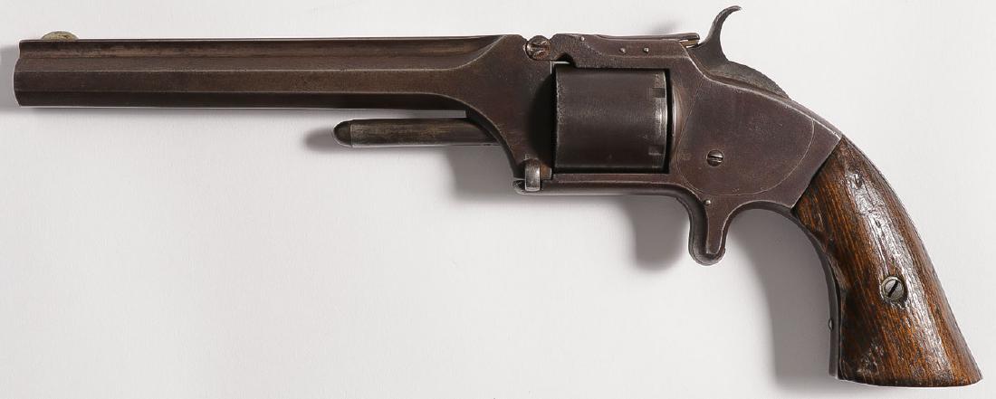 A SMITH & WESSON NO. 2 OLD MODEL ARMY REVOLVER: A SMITH & WESSON NO. 2 OLD MODEL ARMY REVOLVER. Serial number 14536, caliber .32 rimfire, 6-shot, 6-inch octagonal barrel, patent dates on cylinder, walnut grips. SHIPPING NOTICE:Ja