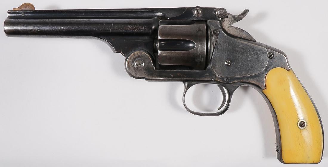 A SMITH & WESSON NO. 3 NEW MODEL SINGLE ACTION: A SMITH & WESSON NO. 3 NEW MODEL SINGLE ACTION REVOLVER. Serial number 17881 (cylinder, butt, barrel) the catch numbered 18788, .41 S & W caliber, 5-inch barrel with fixed front and rear sights.