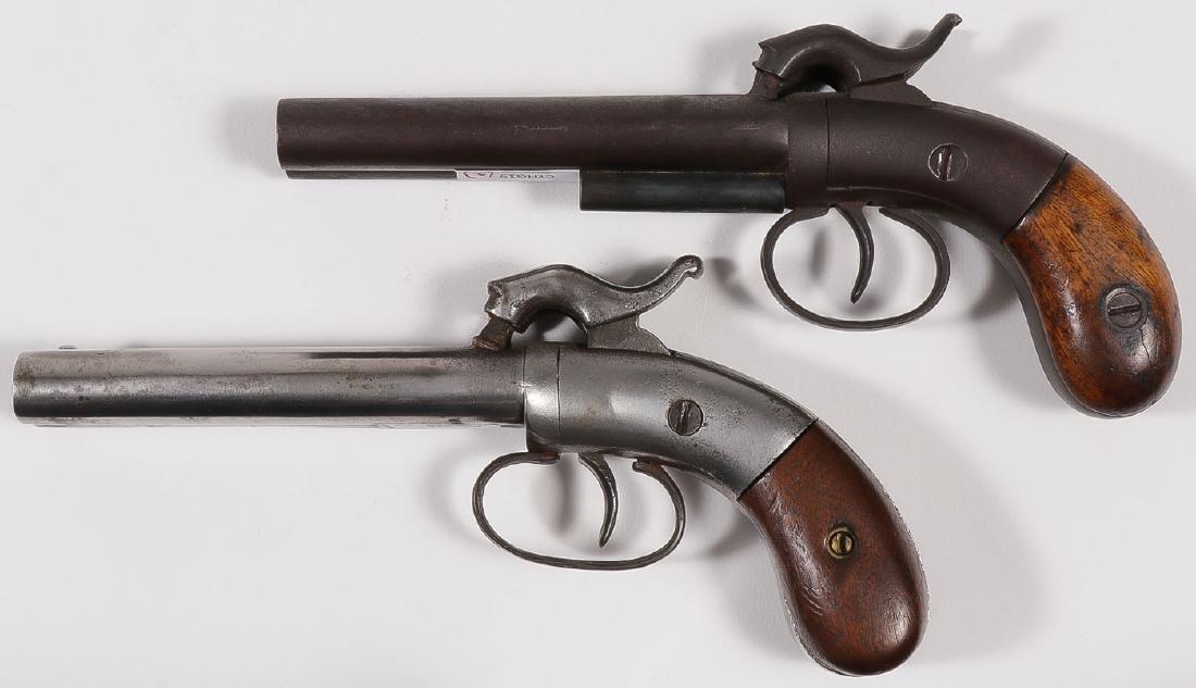 PAIR OF ALLEN & THURBER SINGLE TRIGGER DOUBLE: PAIR OF ALLEN & THURBER SINGLE TRIGGER DOUBLE BARREL PISTOLS. Serial numbers 510 and 203, both .34 caliber percussion with 4-inch barrel. Both stamped with maker's mark on top of barrel. One w
