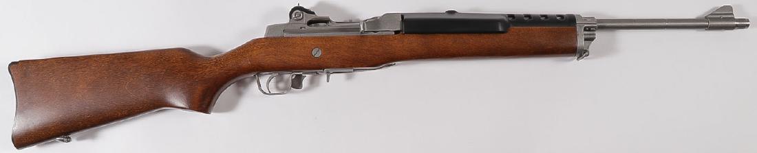 A RUGER MINI-14 .223 CARBINE: A RUGER MINI-14 .223 CARBINE. Serial number 186-61169. With 18.5-inch barrel, wood stock, sling swivels. No Magazine. Requires an FFL for transfer. SHIPPING NOTICE: Jackson's