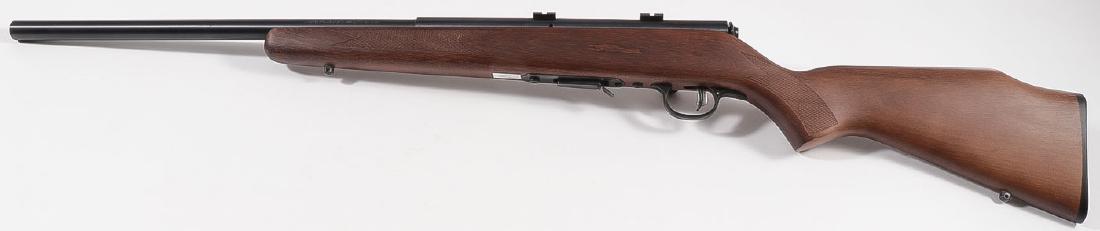 A SAVAGE MODEL 93R17 ACCU-TRIGGER RIFLE: A SAVAGE MODEL 93R17 ACCU-TRIGGER RIFLE. Serial number 1085819. With 20.75-inch round barrel with walnut stock and original factory tag. Likely never fired. Requires an FFL for transfer. SHIP