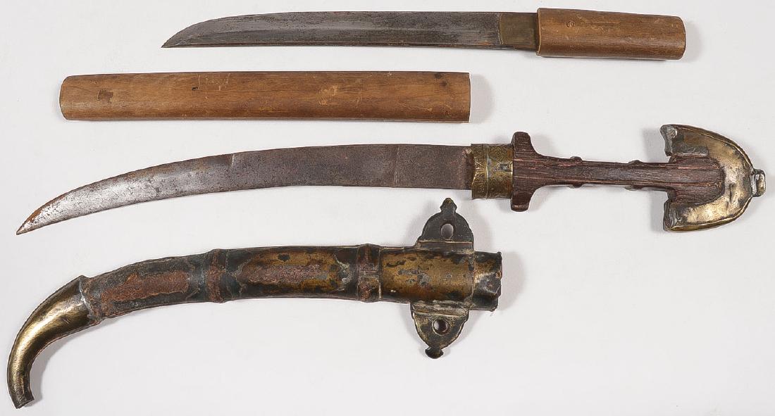 JAPANESE TANTO SWORD & MORE: TWO EDGED WEAPONS. Comprising a Japanese Tanto in plain wood storage case, the blade 9 inches (23 cm), overall length from the tip to the tang 12 inches (30.2 cm). Together with a Middle Eastern style