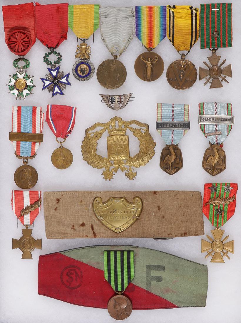 18 MOSTLY FRENCH WWI & II MEDALS AND MORE: 18 MOSTLY FRENCH WWI & II MEDALS AND MORE. Comprising a Legion of Honor, Order of the Black Star, Military Medal, W1 Victory, Czech WWI FIDAC Veterans medal, Belgium W2 Service medal, French W1 War Cr