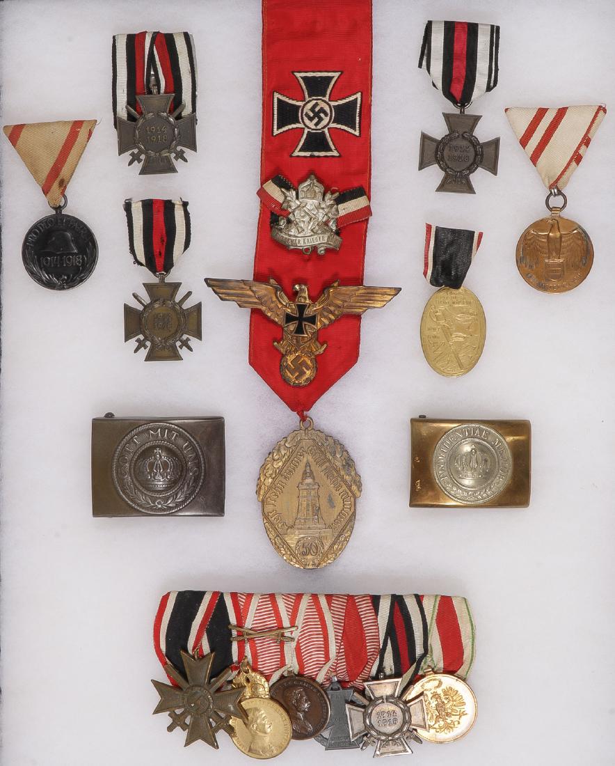 GROUP OF GERMAN/PRUSSIAN & AUSTRIAN WWI MEDALS: GROUP OF GERMAN/PRUSSIAN & AUSTRIAN WWI MEDALS/INSIGNIA. Comprising 12 individual items related to WWI and or Veterans including Prussian Pro Deo Patria W1 medal, 3 Hindenburg Crosses, Austrian W1 ser