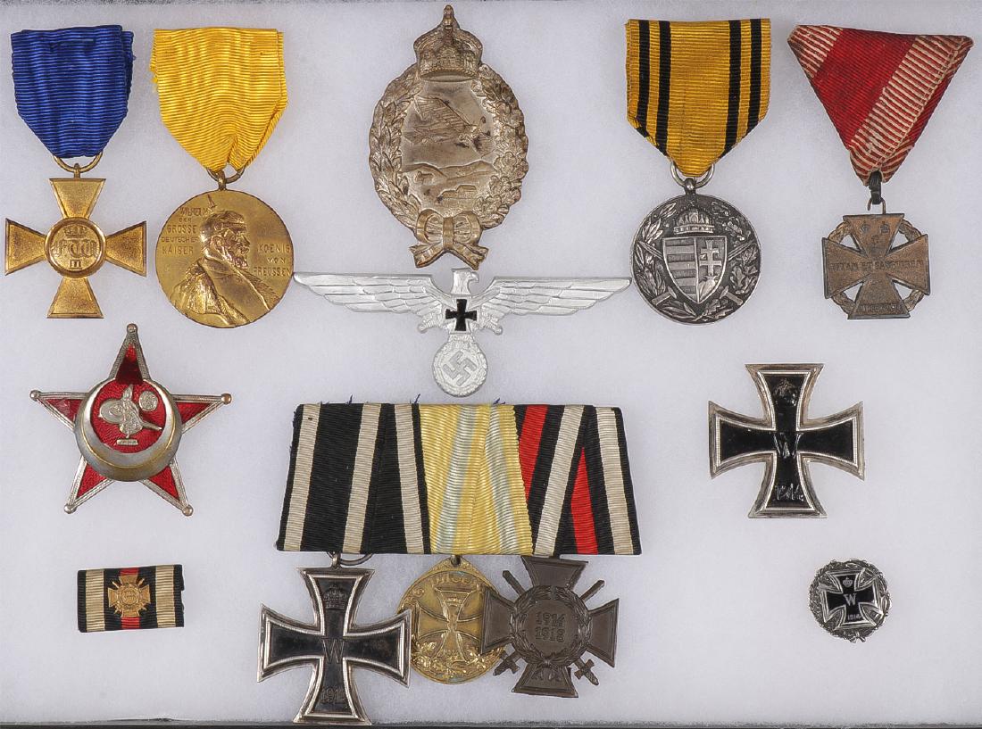 GERMAN, PRUSSIAN, AUSTRIAN MEDALS & BADGES: GERMAN, PRUSSIAN, AUSTRIAN MEDALS & BADGES. Comprising a German W1 Service Cross for 25 years, Kaiser Wilhelm commemorative medal, Prussian Pilot Badge (?), Hungarian Pro Deo Et Patria, Karl Troop Cro