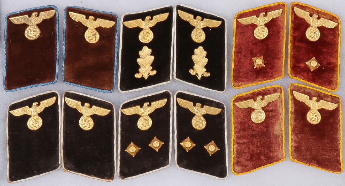 GROUP OF GERMAN WWII NSDAP COLLAR TABS: GROUP OF GERMAN WWII NSDAP COLLAR TABS. Comprising six matching sets including both District, Community and other operational and administrative examples with gilt metal die struck insignia attached b