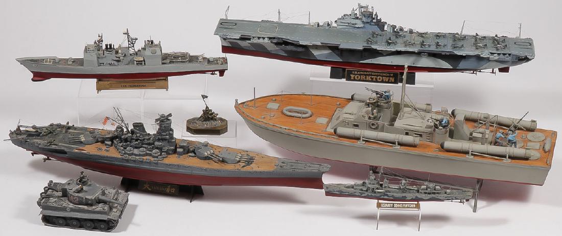 SIX MILITARY MODELS: SIX MILITARY MODELS. Comprising six well-crafted and detailed models primarily navy including a large U.S. Navy PT boat with real wood deck, as well as a model of the Yorktown, Yamato, Ticonderoga