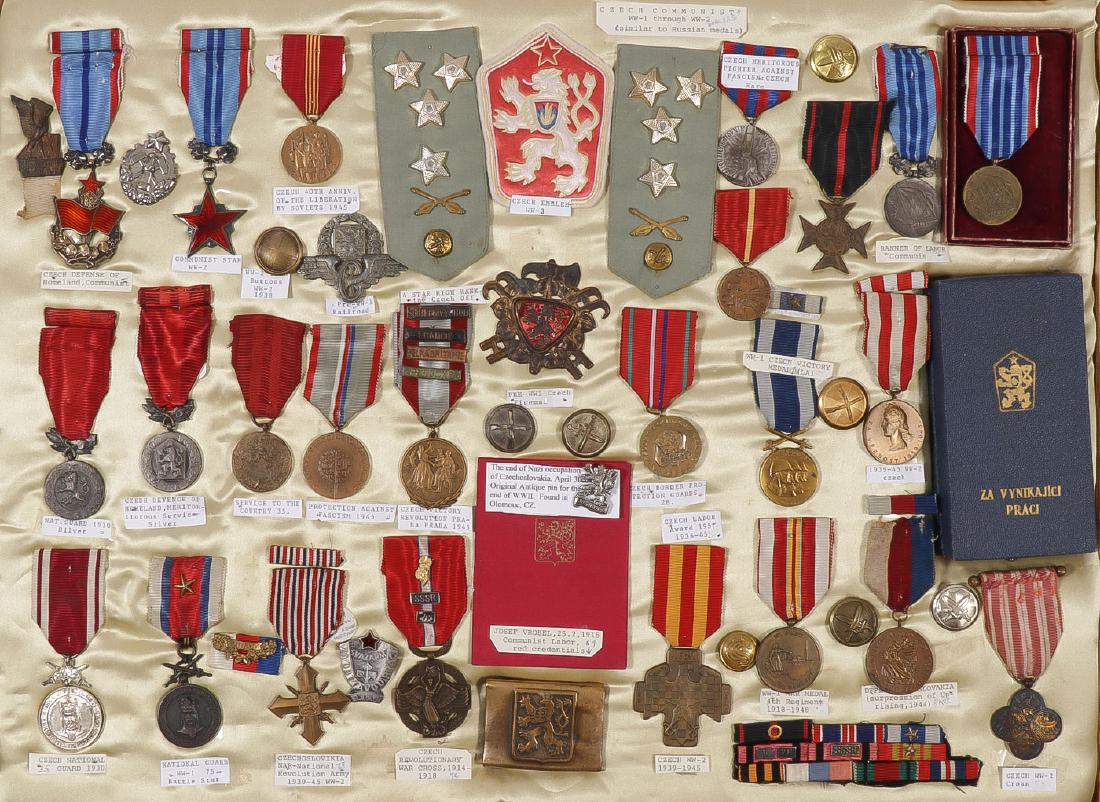 CZECH MEDALS AND INSIGNIA: CZECH MEDALS AND INSIGNIA. A nice extensive collection of various Czechoslovakian mostly military medals, badges, and insignia, from 1914 to 1954. Including various service and defense medals, Nationa