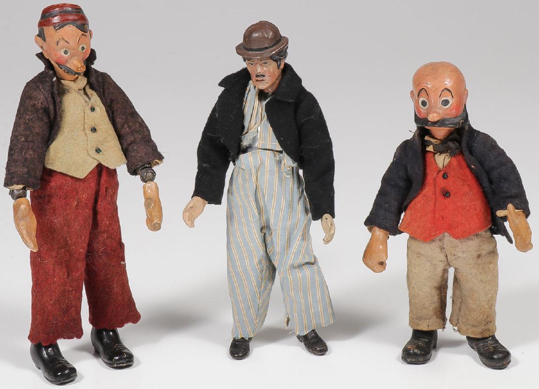 THREE SWISS BUCHERER METAL BALL JOINTED FIGURES: THREE SWISS BUCHERER METAL BALL JOINTED FIGURES. Comprising a Mutt & Jeff figure both in original clothing, one figure missing a few finger tips. Together with a Charlie Chaplin, good original paint o