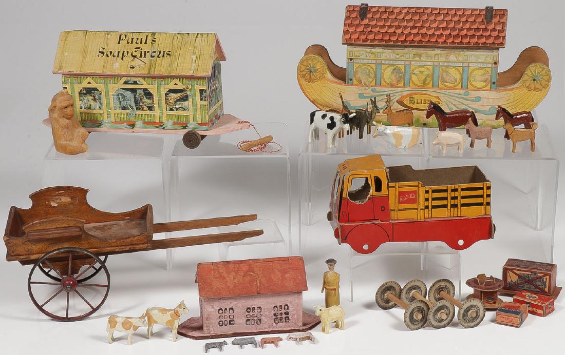 THREE VINTAGE NOAH’S ARKS AND MORE: THREE VINTAGE NOAH'S ARKS AND MORE. Comprising a Bliss lithograph over wood Ark with 11 painted wooden animals (some original some added), length 13 inches, a Paul's Soap Circus Ark, with one 