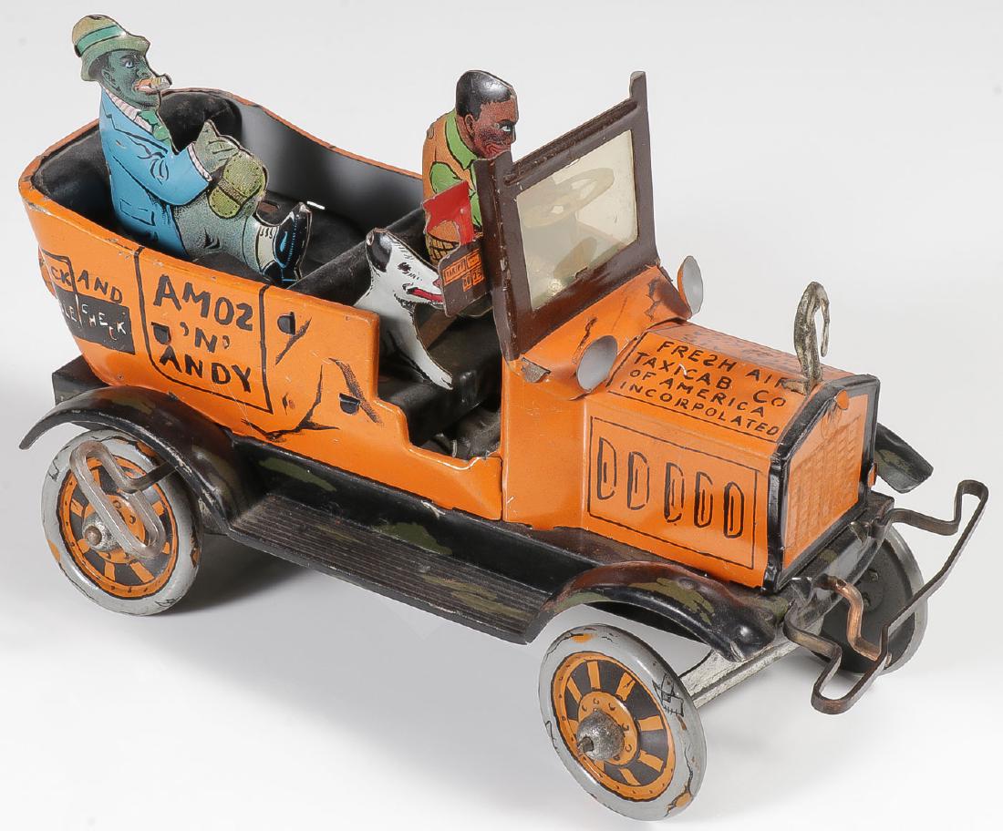 MARX AMOS AND ANDY FRESH AIR TAXI: MARX AMOS AND ANDY FRESH AIR TAXI. Complete, original condition, takes a wind and runs. Length 8 inches. Provenance: From the lifetime collection of Thomas "Tom" W. Abbas (1945-2016).
