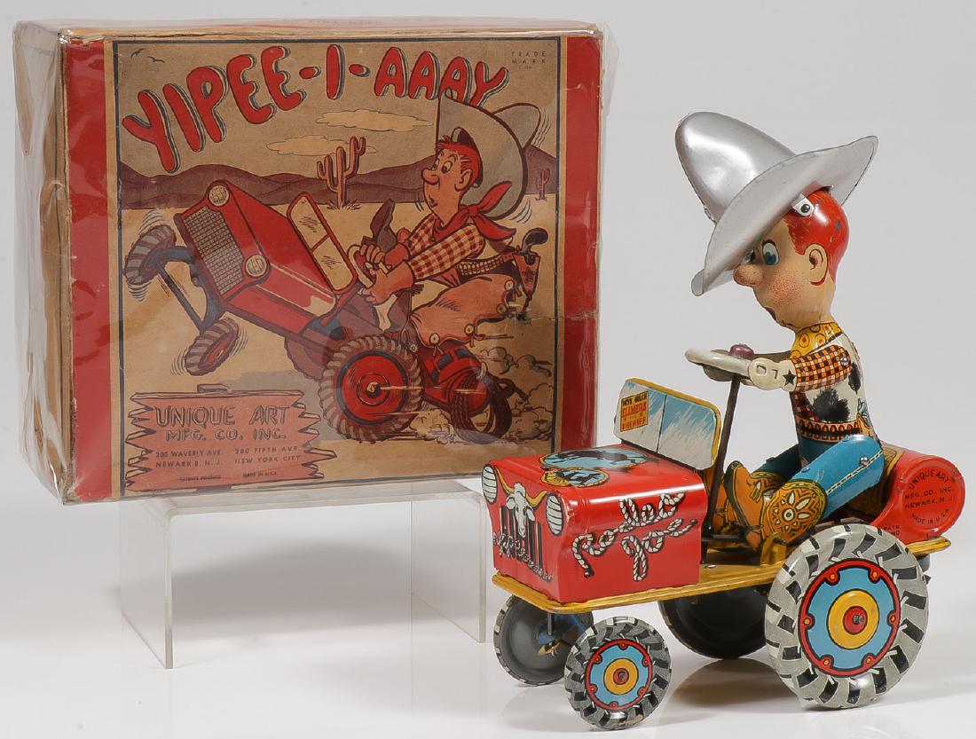 UNIQUE ART TIN RODEO JOE WITH BOX: UNIQUE ART TIN RODEO JOE WITH BOX. Comprising a good functioning YIPEE-I-AAAY RODEO JOE whoopee car with very fine original box. Provenance: From the lifetime collection of Thomas "Tom&#