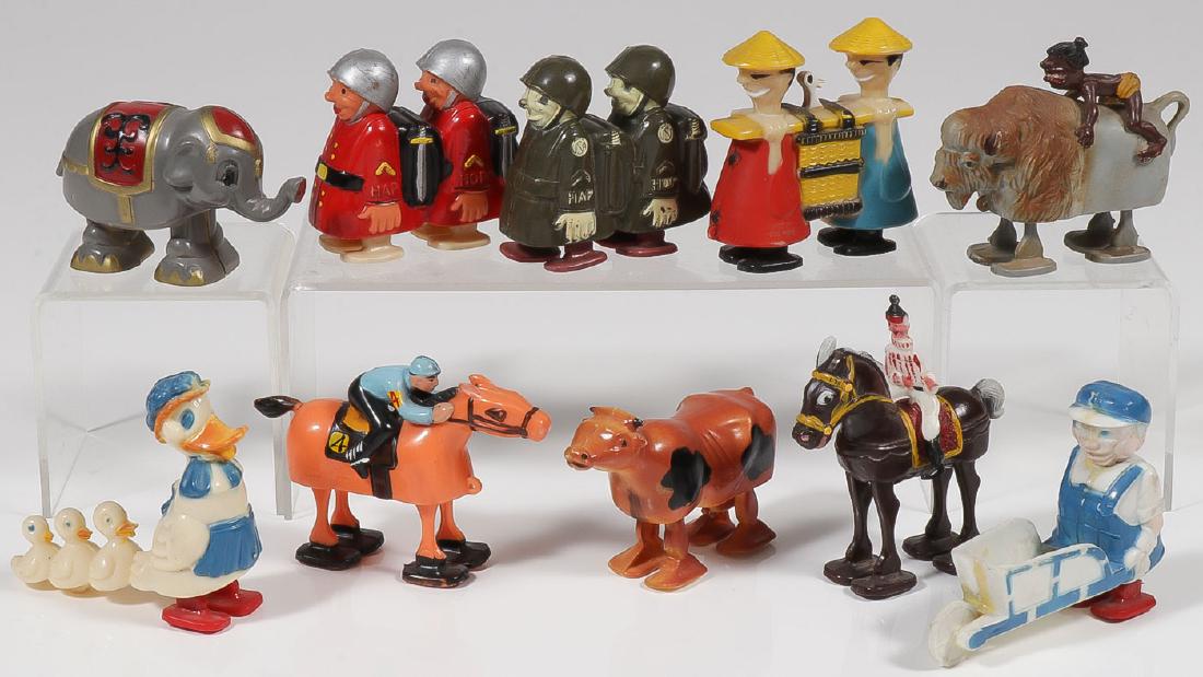10 RAMP WALKER TOYS: 10 RAMP WALKER TOYS. Comprising various examples and models including a caveman on buffalo, Chinese carrying a duck, ducks, Hap and Hop soldiers in British and U.S. colors and others. Provenance: Fr