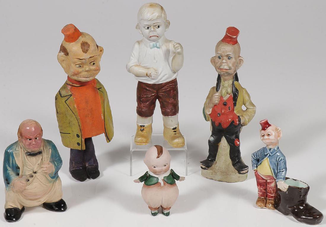GROUP OF VINTAGE CHARACTER FIGURES: GROUP OF VINTAGE CHARACTER FIGURES. Comprising an early papier-mache Happy Hooligan bobble body figure (height 9.25 inches), a good colorful and well sculpted bisque porcelain Happy Hooligan (heig