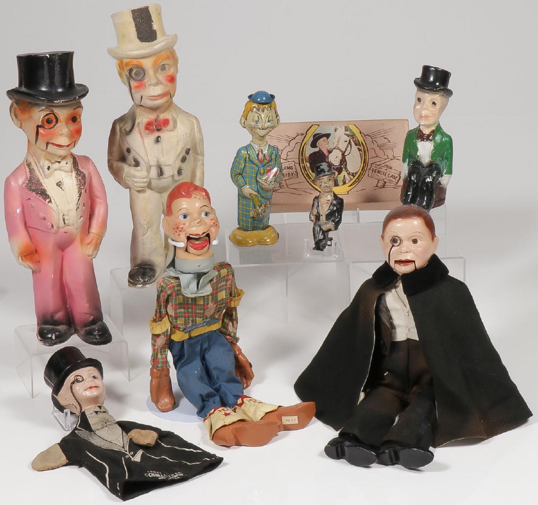 NINE VINTAGE POP-CULTURE FIGURES, C 1930-1950: NINE VINTAGE POP-CULTURE FIGURES, C. 1930-1950. Comprising a nice composition Charlie McCarthy ventriloquist dummy in original clothing, a Charlie McCarthy hand-puppet with composition hea