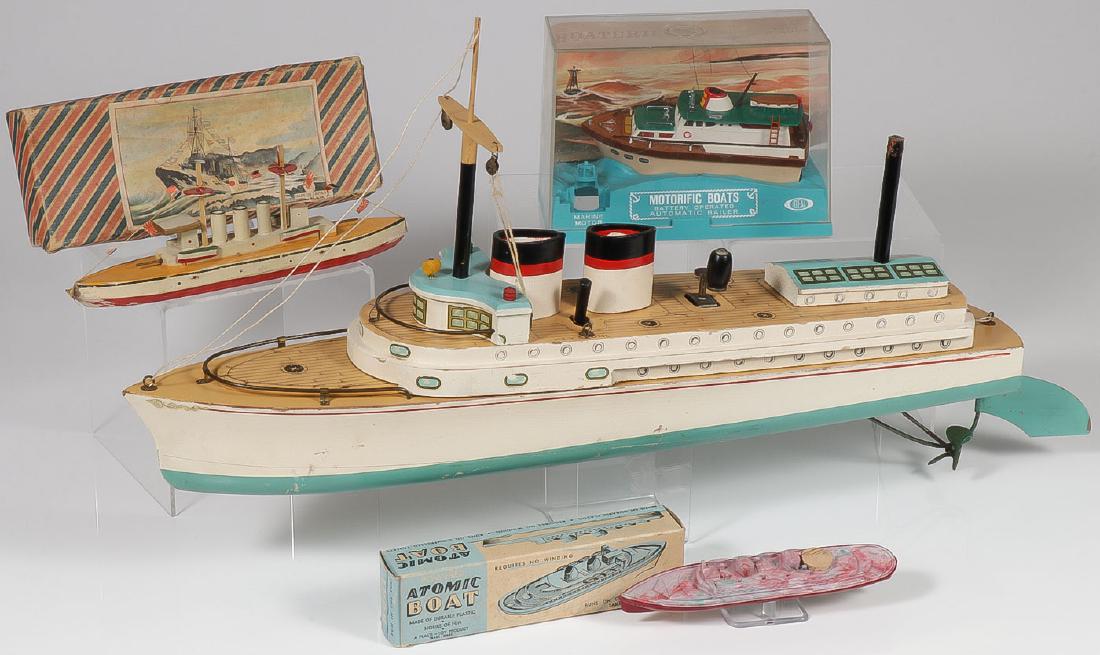VINTAGE TOY BOAT GROUP: VINTAGE TOY BOAT GROUP. Comprising a large wood Keystone wind-up steamboat, takes a wind but propeller not attached, length 24 inches, a pre-war Japanese painted wood battleship in original b