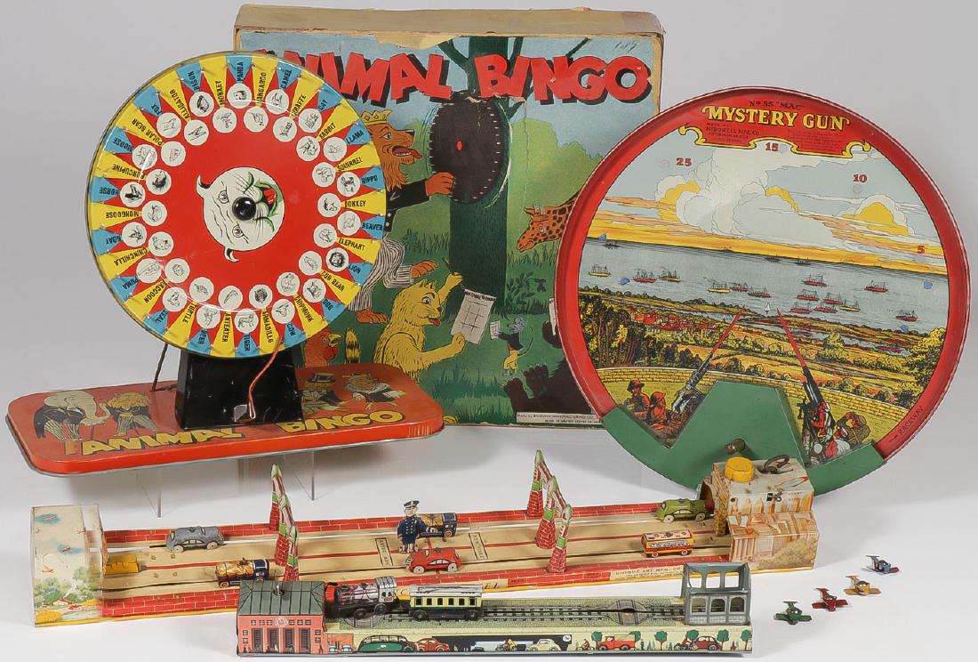 VINTAGE TIN GAMES, C 1930-1940: VINTAGE TIN GAMES, C. 1930-1940. Comprising "Animal Bingo" with original colorful lithograph box, a McDowell MFG Co. tin litho "Mystery Gun" with original parts, a Unique Art Linco