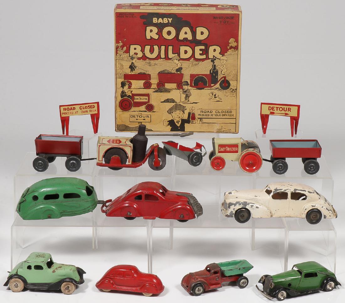 LOT OF 1920-1930’S AUTOMOTIVE TOYS: LOT OF 1920-1930'S AUTOMOTIVE TOYS. Comprising a good variety of automotive toys including an Animate Baby Road Builder set with tractor and steam roller and other accoutrements in original bo