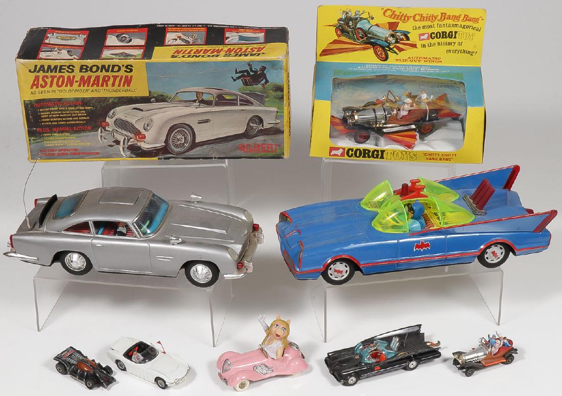 SIX VINTAGE CINEMA TV TOYS INCL JAMES BOND: SIX VINTAGE CINEMA TV TOYS INCL JAMES BOND. Comprising a good Gilbert James Bond Aston Martin with original box, in good working order but missing ejected villain (length 11.5 inches), a Corgi Toys Ch