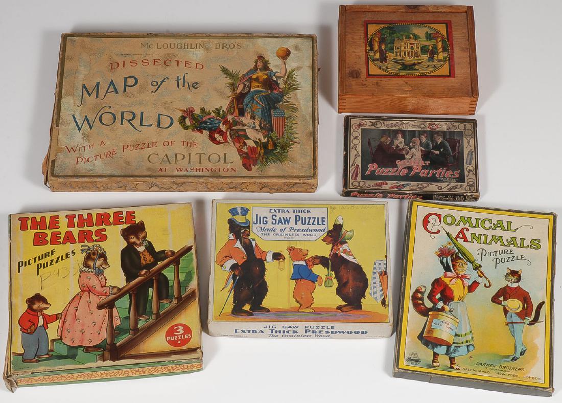SIX VINTAGE PUZZLES: SIX VINTAGE PUZZLES. Comprising McLoughlin Brothers Map of The World Puzzle with original box, a Whitman Extra Thick Three Little Bears jigsaw puzzle, an early Parker Brother's Comical Animals pic