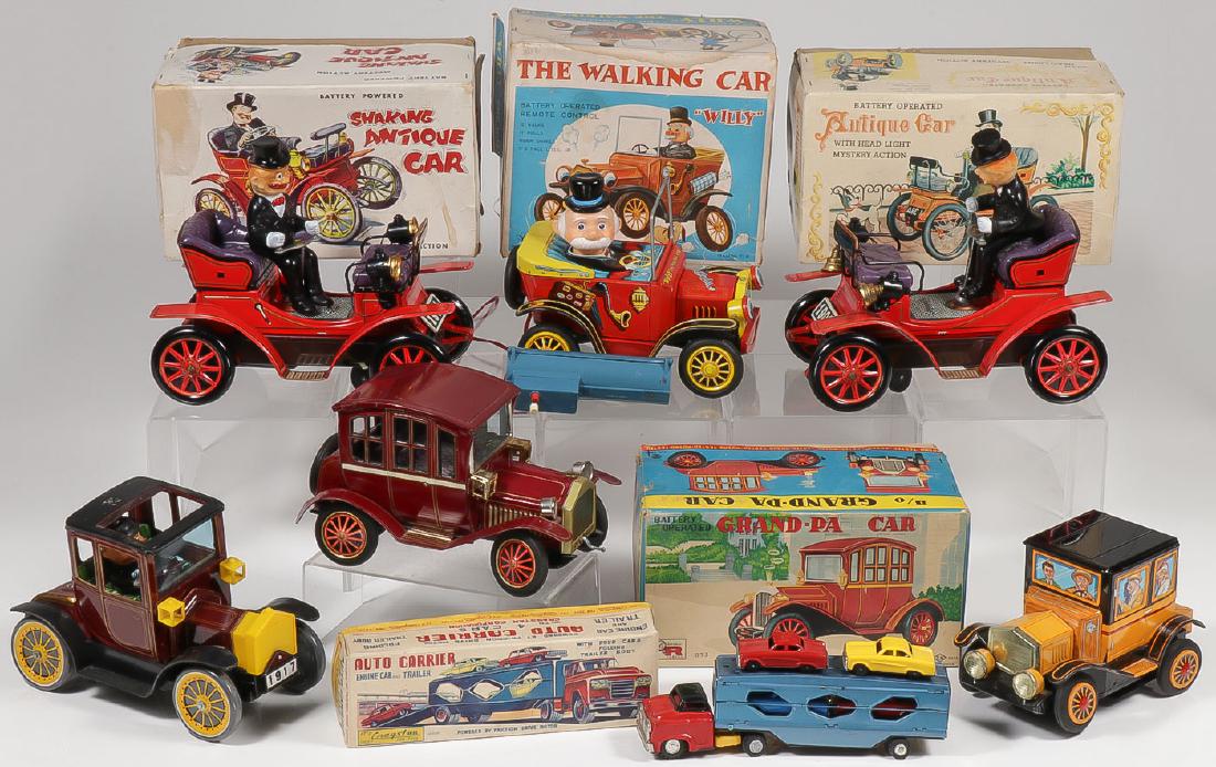 SIX VINTAGE BATTERY POWERED CARS: SIX VINTAGE BATTERY POWERED CARS. Comprising three Japanese T.N. vintage cars including a Grandpa car in the box, a Shaking Antique Car and an Antique Car, both with original box. Together with a Will