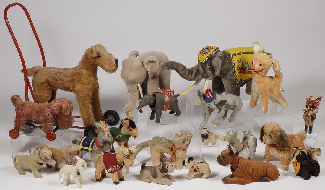 24 VINTAGE ANIMAL TOYS: 24 VINTAGE ANIMAL TOYS. Including a mohair push cart terrier, a Steiff elephant, a Clemens goat, a Ringling Brothers elephant, a Rudolph, a smaller mohair pull toy terrier, together with a variety of 