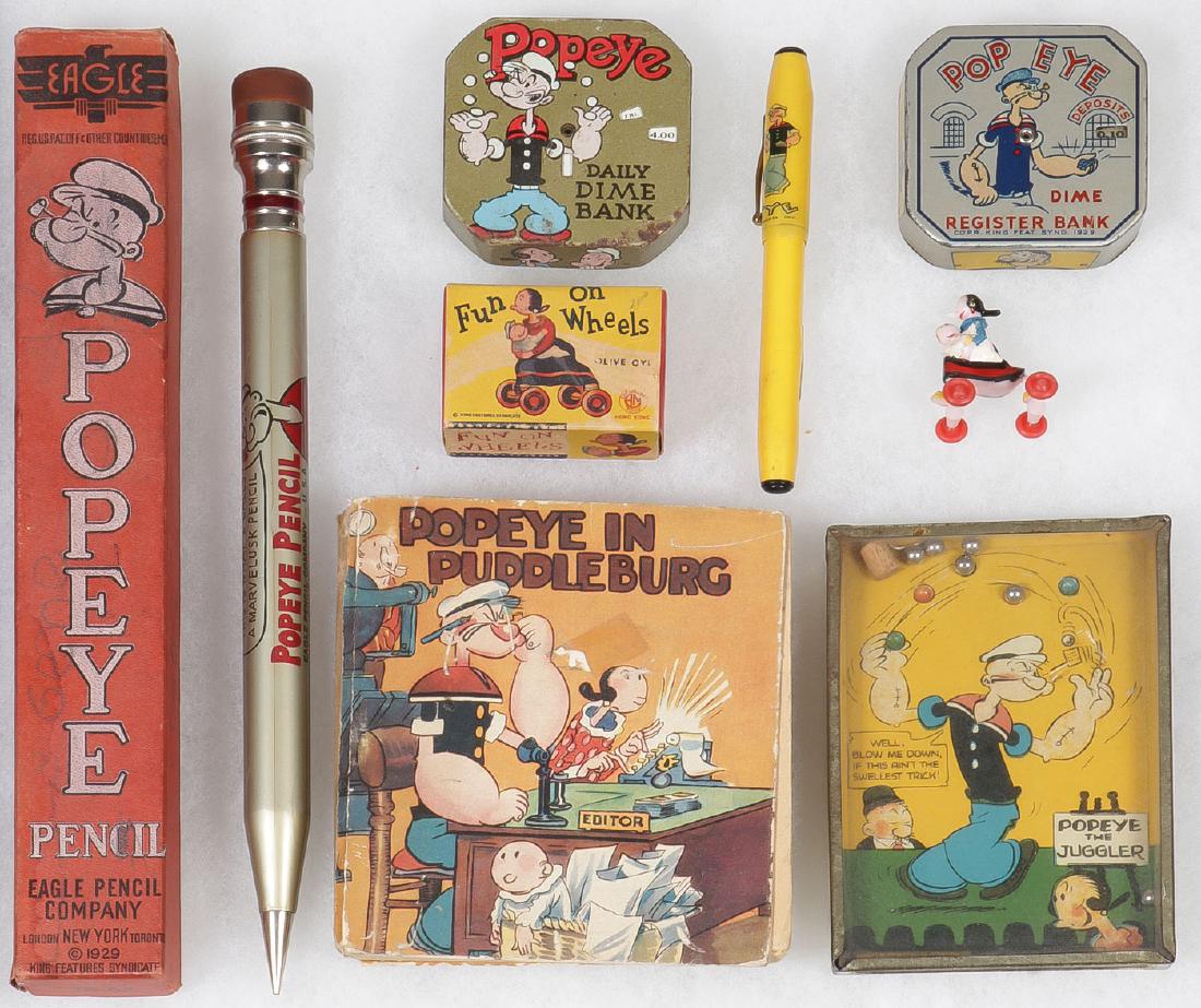 VINTAGE POPEYE RELATED TOYS: VINTAGE POPEYE RELATED TOYS. Comprising a Popeye Eagle pencil in original box (10 inches), a Popeye the Juggler dexterity toy, a Popeye Dime Register Bank, and a Popeye Daily Dime Bank, an Olive Oyl F