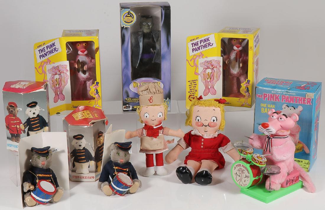EIGHT VINTAGE TOYS, MOST IN BOX: EIGHT VINTAGE TOYS, MOST IN BOX. Comprising two Illco wind-up cymbal playing Pink Panthers in original boxes, height 10 inches each, an Illco battery-operated Pink Panther One Man Band in box,