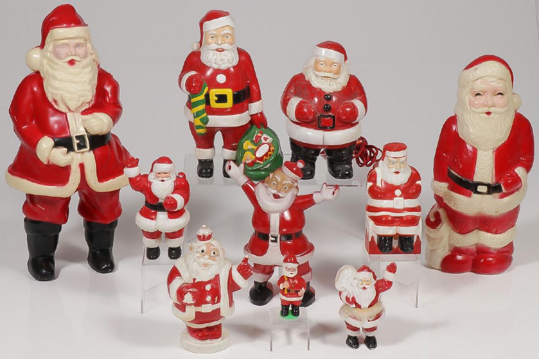 SIX VINTAGE PLASTIC SANTA LAMPS: SIX VINTAGE PLASTIC SANTA LAMPS. Various sizes. Also includes four other plastic Santas including a nodder. Greatest height 16.5 inches.Provenance: From the lifetime collection of Patricia Miller (1