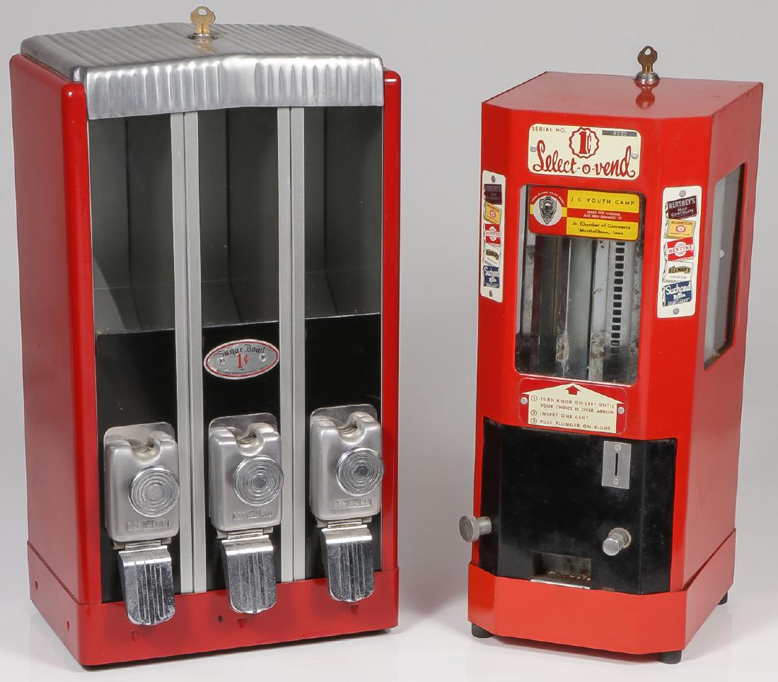 A PAIR OF ONE-CENT CANDY VENDING MACHINES: A PAIR OF ONE-CENT CANDY VENDING MACHINES. Comprising a Select-O-Vend 1-Cent Candy & Gum machine with an eight column vending mechanism in working condition with key. Together with a o
