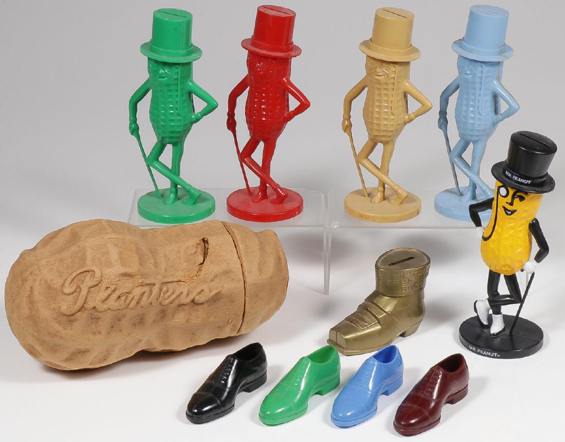 VINTAGE PLANTERS PEANUTS ADVERTISING & MORE: VINTAGE PLANTERS PEANUTS ADVERTISING & MORE. Comprising three Mr. Peanut plastic banks, a Planters papier-mache peanut shaped container, four Hanover plastic shoe premiums, and a Poll-Parrot t