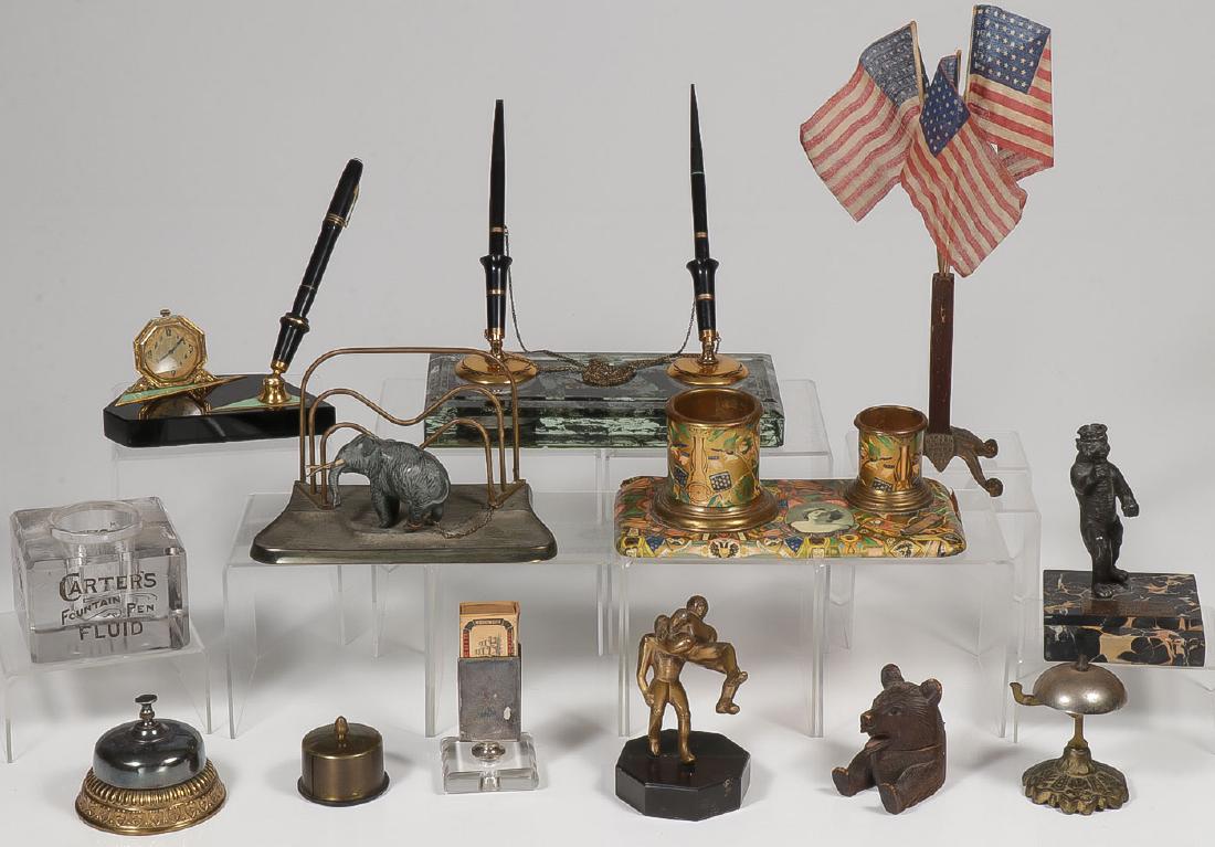 A DOZEN VINTAGE DESK ITEMS: A DOZEN VINTAGE DESK ITEMS. Comprising various pen holders, bells, paper weights, inkwells, and others, including a large Carter's Fountain Pen inkwell, a Sheaffer's Lifetime pen and pencil se