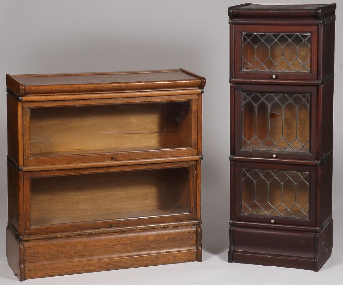 TWO SECTIONAL BARRISTER BOOKCASES: TWO SECTIONAL BARRISTER BOOKCASES. Comprising a scarce half sized Macey, three section bookcase with leaded glass doors on front of each section. Height 47.5 inches x width 17 inches x depth 12.5 inc