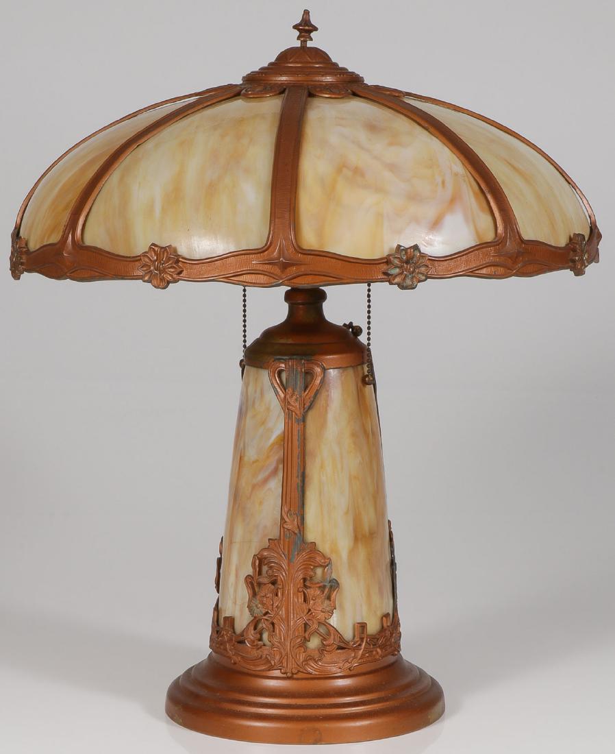 A PAIR OF VINTAGE SLAG GLASS LEADED LAMPS: A PAIR OF VINTAGE SLAG GLASS LEADED LAMPS. One with illuminated base, greatest height 25 inches. SHIPPING NOTICE: Jackson's is your sole and only source for one stop packing and shipping.