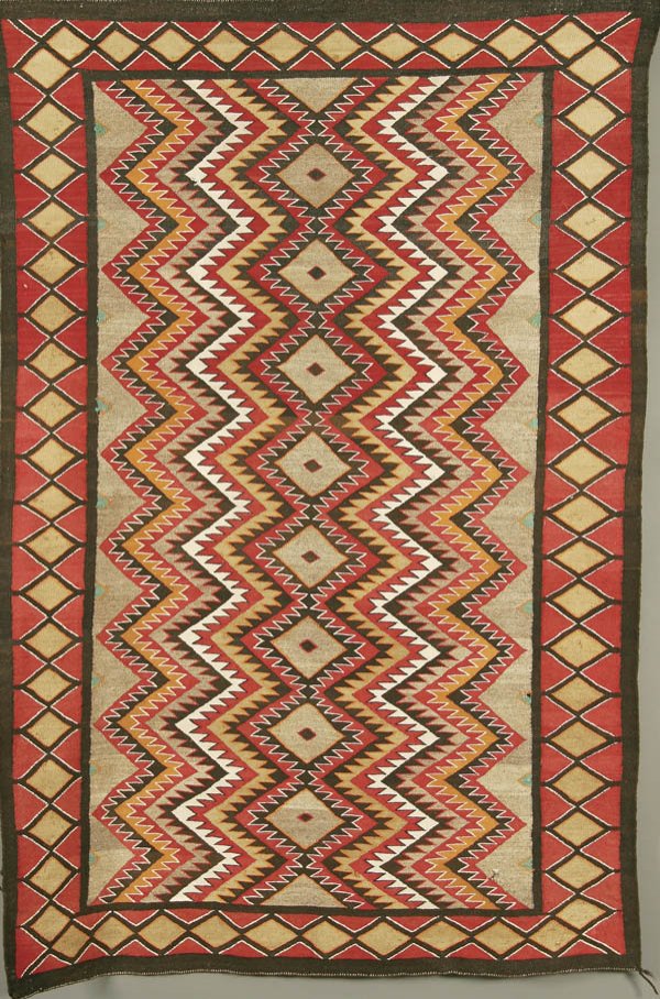 A VERY FINE RED MESA OUTLINE WOVEN RUG, circa 190