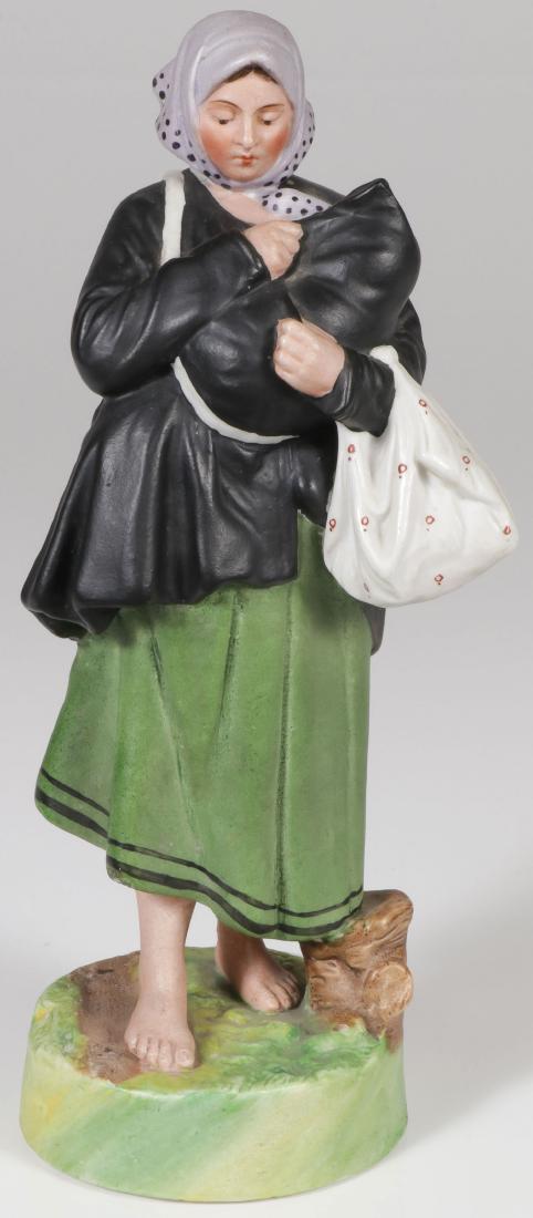 SOVIET PORCELAIN FIGURE, CIRCA 1925: A RUSSIAN BISQUE PORCELAIN FIGURE OF A PEASANT WOMAN WITH CHILD, C. 1925. Finely modelled, the edge of base with impressed 1673, underside of base with obliterated overglazed blue mark likely Dmitriev