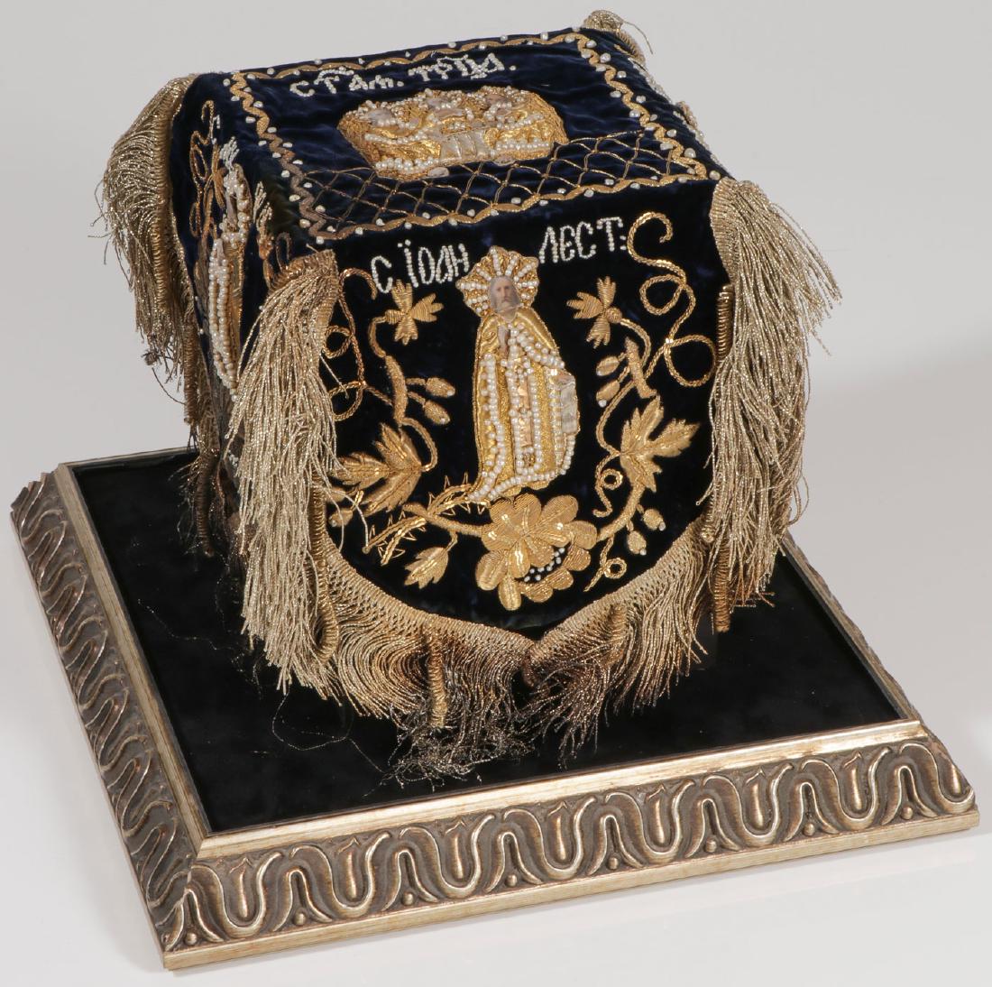 FINE RUSSIAN EMBROIDERED CHALICE VEIL, C 1890: A VERY FINE RUSSIAN EMBROIDERED AND BEADED CHALICE VEIL, C. 1890. The quatrefoil velvet base with padded bullion embroidered figures including the Old Testament Trinity (center), The Holy Prophetess A