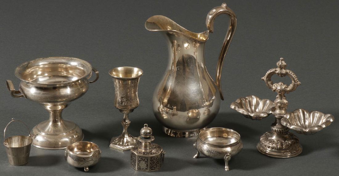 EIGHT PIECES OF MIXED RUSSIAN SILVER C 1870-1900: EIGHT PIECES OF MIXED RUSSIAN SILVER, CIRCA 1870 - 1900. Comprising a large silver pitcher on spread ring foot with scroll handle, hallmarked Warsaw, dated 1898, and maker's name of Anton Riedel, heig