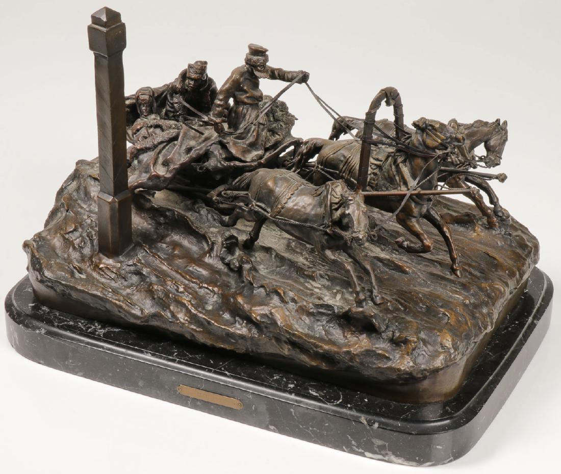 LARGE BRONZE WINTER TROIKA GROUP: A LARGE RUSSIAN BRONZE WINTER TROIKA GROUPING, AFTER GRACHEV. Comprising a large and impressive patinated bronze figural grouping of a winter troika scene depicting a driver and a man and woman passe