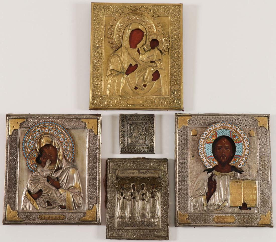 A GROUP OF FIVE RUSSIAN ICONS: A GROUP OF FIVE RUSSIAN ICONS. Comprising a wedding type set, one depicting Christ, the other the Vladimir Mother of God. Both overlaid with silver and gold plated metal oklads and cloisonnÉ ena