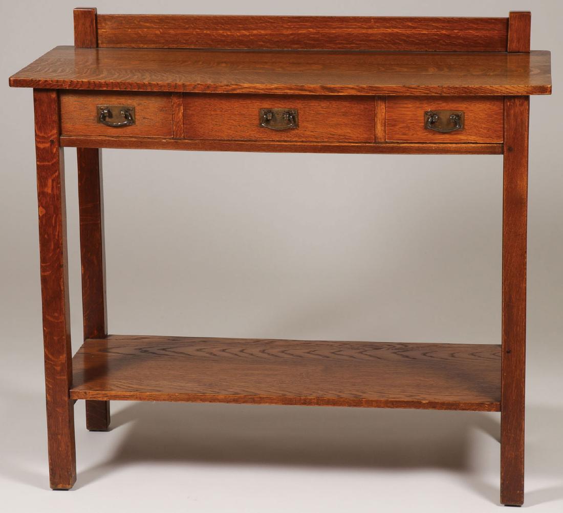 L & JG STICKLEY SERVING TABLE #741: L & JG STICKLEY SERVING TABLE #741. Comprising a server with rectangular top above three drawers with original pulls and lower shelf. Maker's decal inside drawer. 44 inches x 18 inches x 39.5 inches. 
