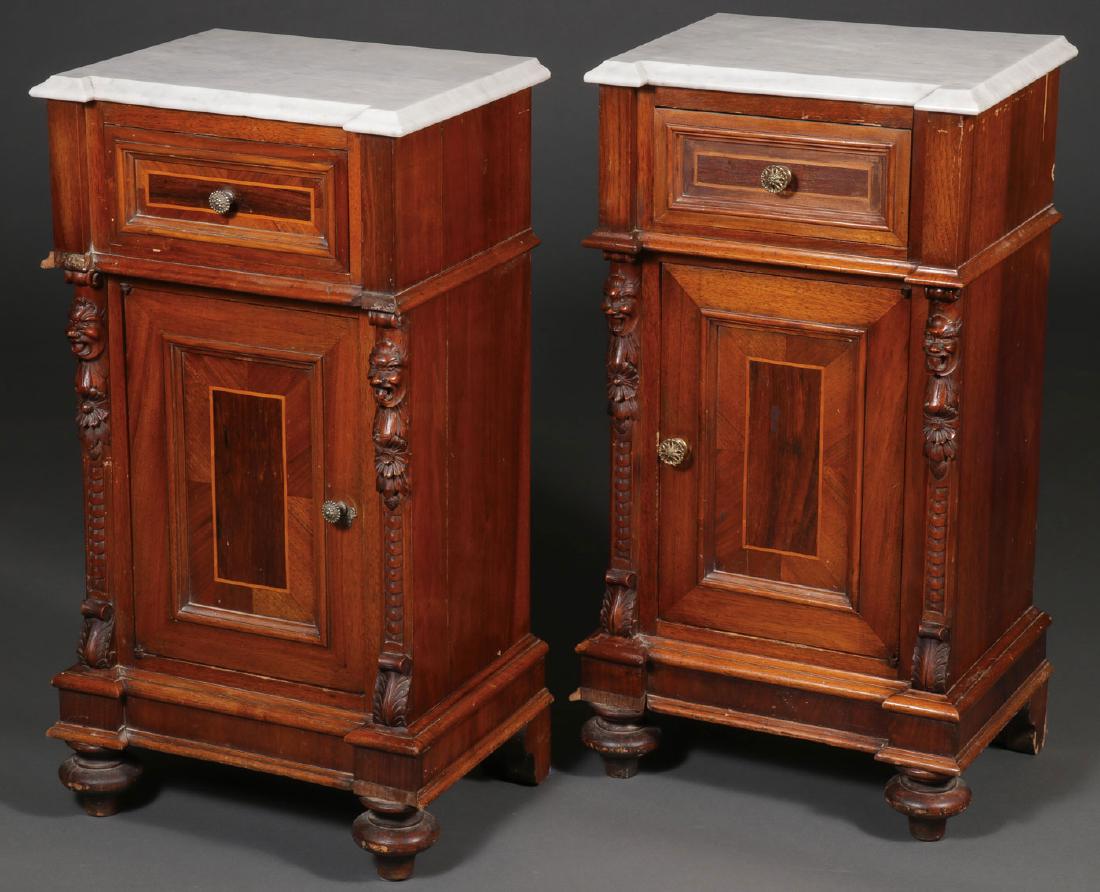 A PAIR OF AMERICAN WALNUT MARBLE TOP COMMODES: A PAIR OF AMERICAN WALNUT MARBLE TOP COMMODES. Two matching marble top commodes each with a single drawer atop a compartment that opens to reveal a shelved compartment. Both with minor losses and mism