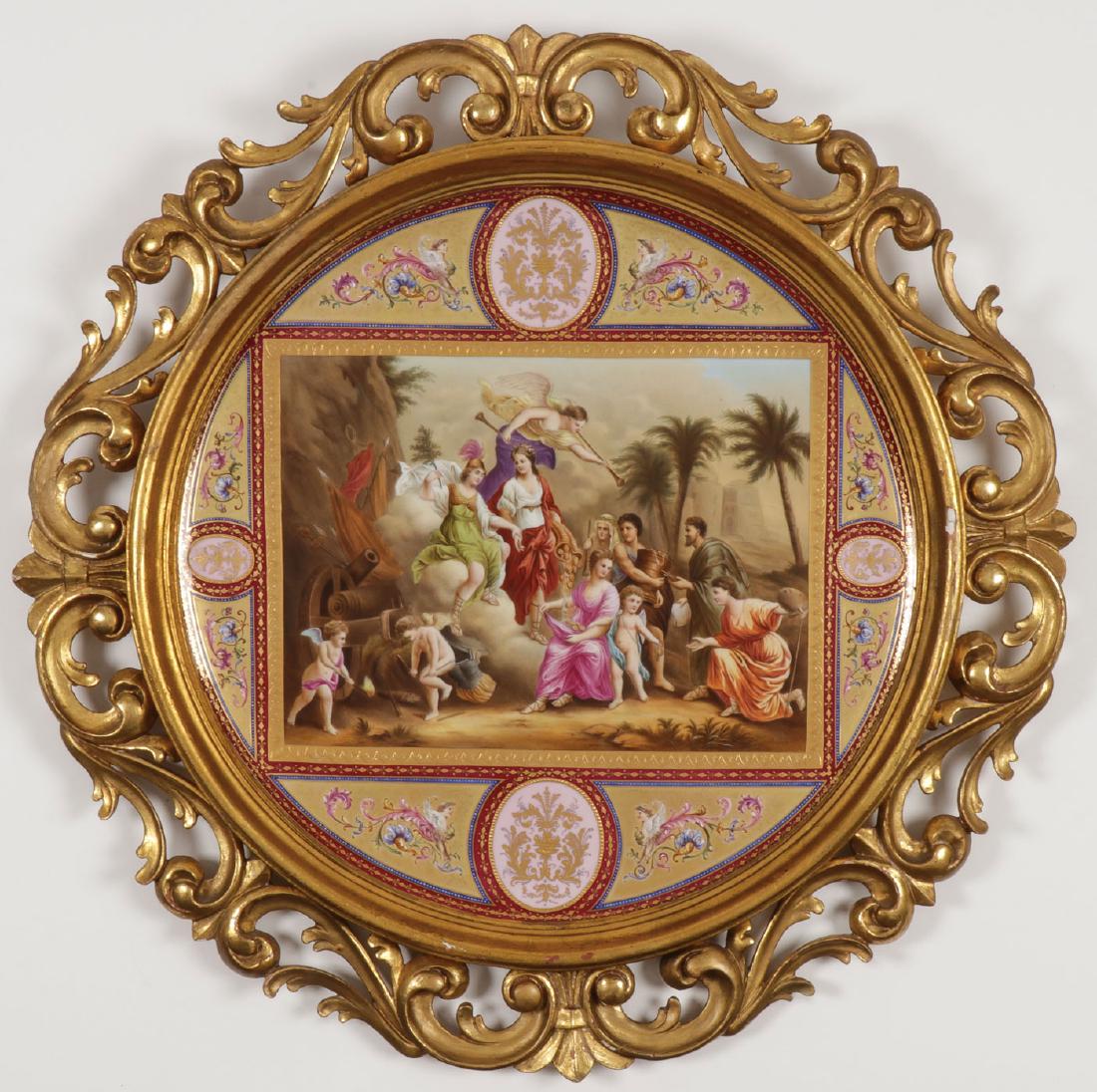 LARGE ROYAL VIENNA CHARGER ARTIST SIGNED C 1900: A MASSIVE HAND-PAINTED ARTIST SIGNED ROYAL VIENNA CHARGER, C. 1900. The large porcelain charger with sunken cavetto painted in gilt and with multi colored cartouche, and at center, finely painted with
