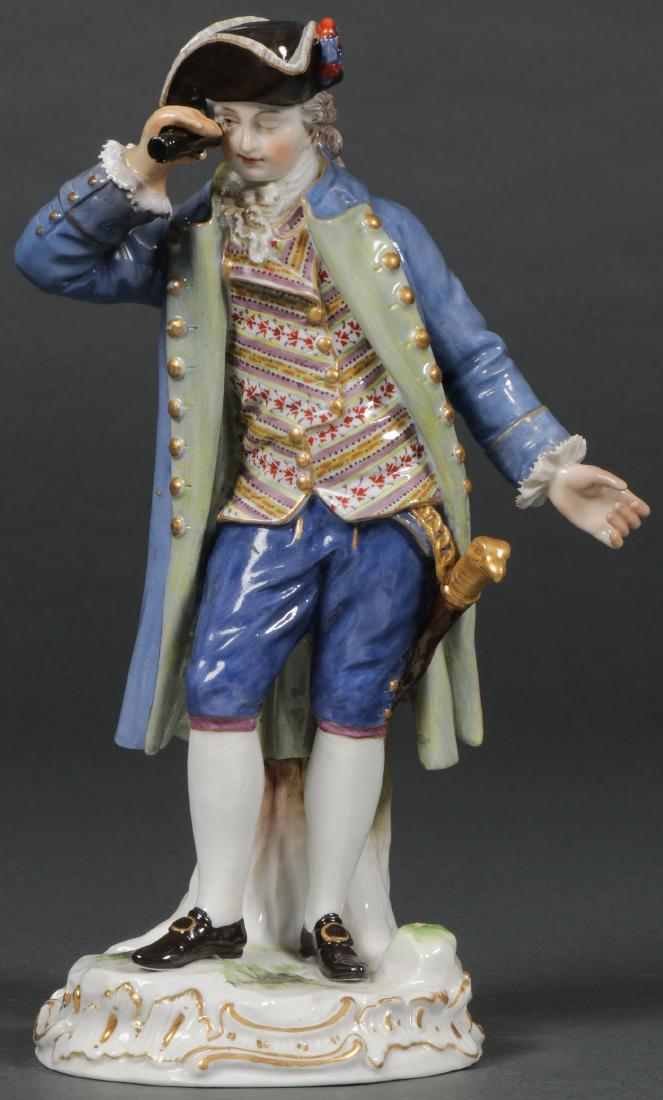 MEISSEN PORCELAIN FIGURE OF GALLANT WITH SPYGLASS: A MEISSEN PORCELAIN FIGURE OF GALLANT WITH SPYGLASS. Finely modelled with tricorne hat, eagle head handled sword, holding a spyglass, and resting on a rocaille base with gilt highlights and painted wi