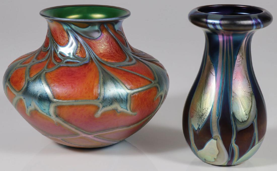 A PAIR OF LOTTON ART GLASS VASES: A PAIR OF LOTTON ART GLASS VASES. Comprising a bulbous formed vase with slightly flared lip in coral leaf and vine design. Signed on base Daniel Lotton and dated 1990. Height 6.5 inches. Diameter 8 i