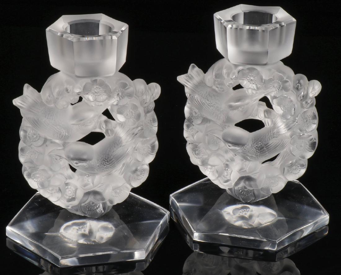 A PAIR OF LALIQUE MESANGES CANDLE STICKS: A PAIR OF LALIQUE MESANGES CANDLE STICKS. Height 6.5 inches SHIPPING NOTICE: Jackson's is your sole and only source for one stop packing and shipping. With over 50 years of experience, our profess